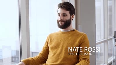 male student sits for interview