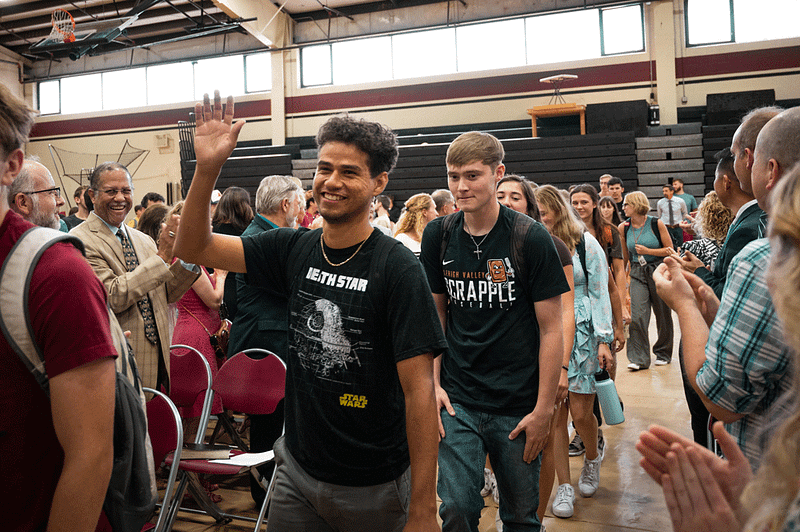 new freshmen walk into convocation chapel
